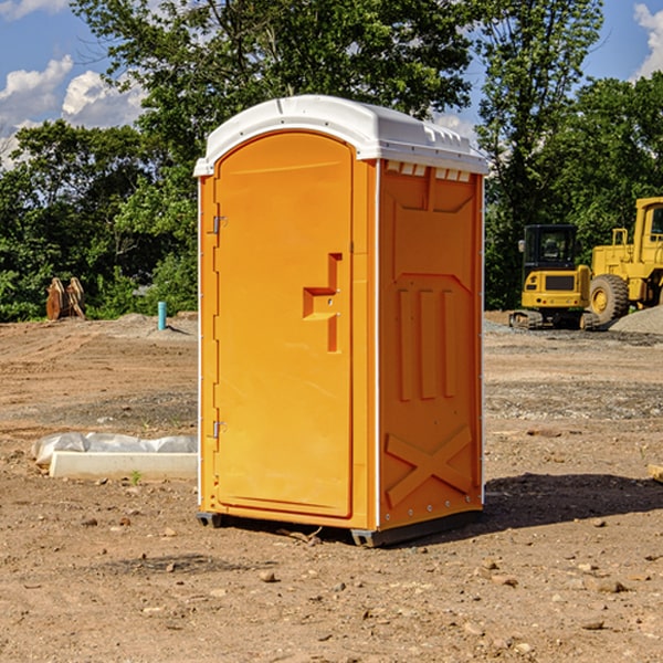 how often are the portable restrooms cleaned and serviced during a rental period in Wild Peach Village